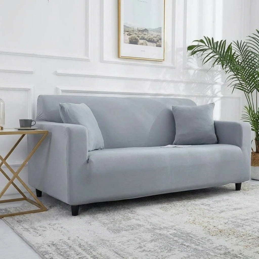 Housse de canapé extensible unie NEWTON – Gris clair