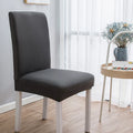 Housse de chaise extensible unie NEWTON gris foncé