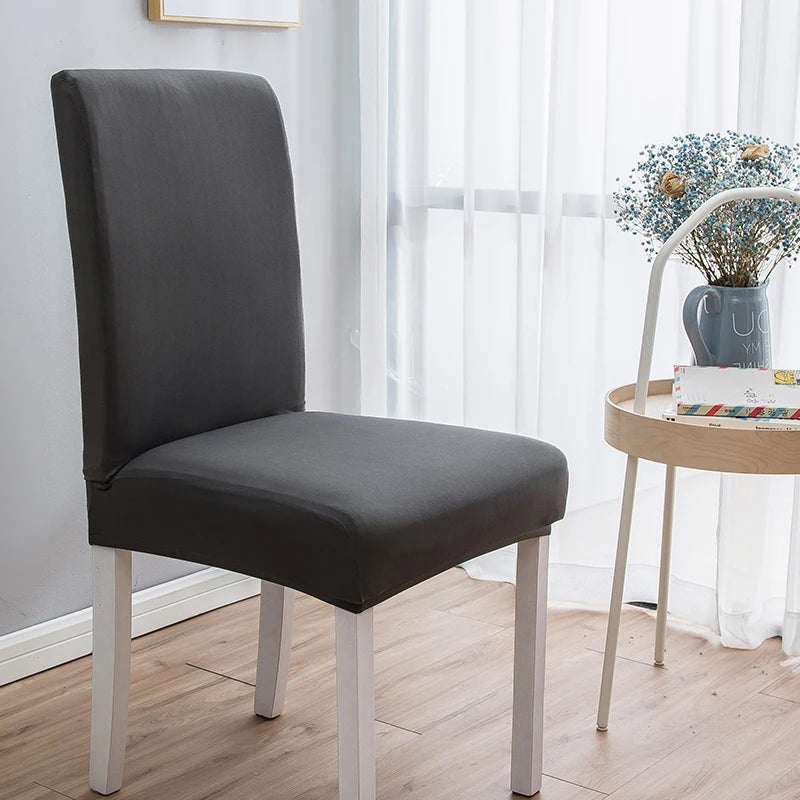 Housse de chaise extensible unie NEWTON gris foncé