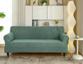 Housse de canapé imperméable unie RIVERTONE vert amande