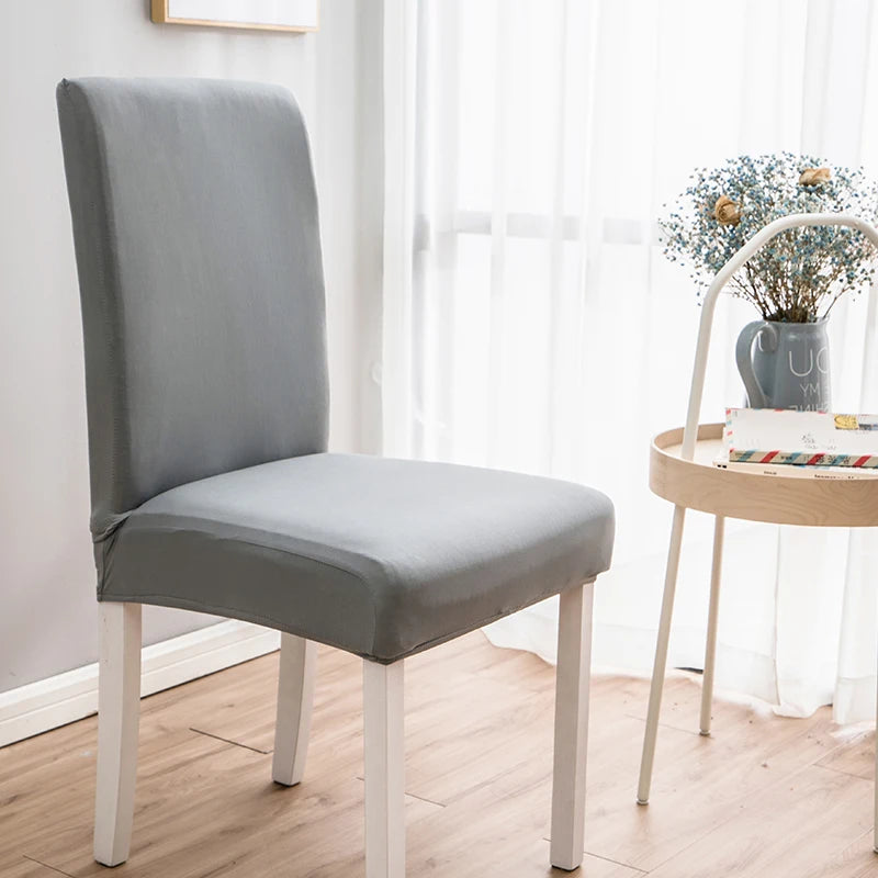 Housse de chaise extensible unie NEWTON gris clair
